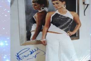 Kim Tiddy Signature