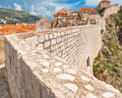 The wall which surrounds the city and safeguards the residents was made about 500 years before. It is a strong wall about 6 meters thick.
