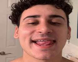 Aaron has a piercing in his ears Aaron has a piercing in his ears.