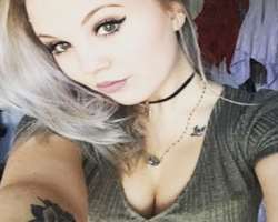 She is a tattoo over and has various tattoos on her hands, shoulder and wrist She is a tattoo over and has various tattoos on her hands, shoulder and wrist.