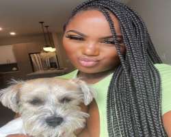 The star has adopted a dog who often appears in her post.