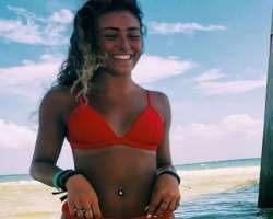 She has piercing in her belly button She has piercing in her belly button.