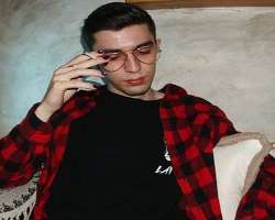 Fotis is seen with glasses in many of his posts.