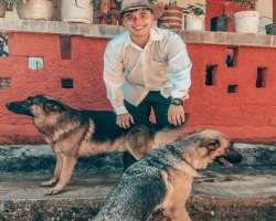 He is an animal lover and especially likes dogs. He enjoys playing with them. His dog named Jupiter.