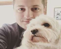 He is an animal lover and has a cute Pomeranian dog in his home He is an animal lover and has a cute Pomeranian dog in his home.
