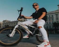 He loves to ride his bicycle and flaunts his stunt skills while riding it.