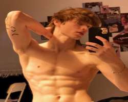 Nikolay has maintained his six-peck abs by working hard at gym.