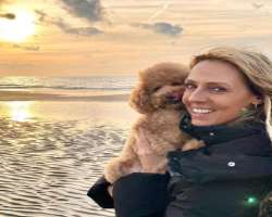 She has adopted a female poodle and named her Simba. She often plays and spends time with her dog.