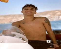 He enjoys water sports activities much and loves to spend his most of the time while playing in the water.