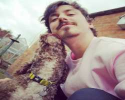 He is an animal lover, and it seems that the animal also loves him He is an animal lover, and it seems that the animal also loves him.