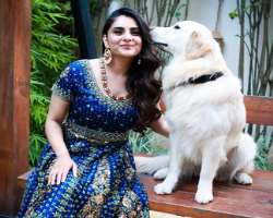 She is an animal lover and it looks like animals also love her company.