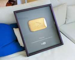 He is honoured for his main channel with a golden and silver button from YouTube.