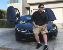 Alongside his passion for videogames, he is also interested in automobiles and often photographs in front of expensive automobiles.
