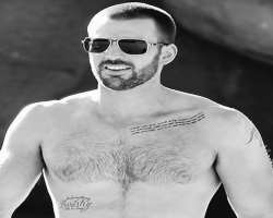 He had various tattoos on his body, we can also say he is a 