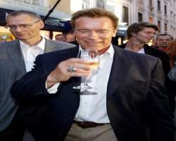 Arnold Schwarzenegger consuming alcohol