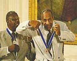 In 2002 Hank Aaron Receives the Presidential Medal of Freedom In 2002 Hank Aaron Receives the Presidential Medal of Freedom.